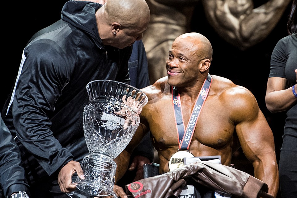 2019 Arnold Pro Wheelchair Champion Harold Kelley Congratulated by Shawn Rhoden photo by Lexi Browning.jpg