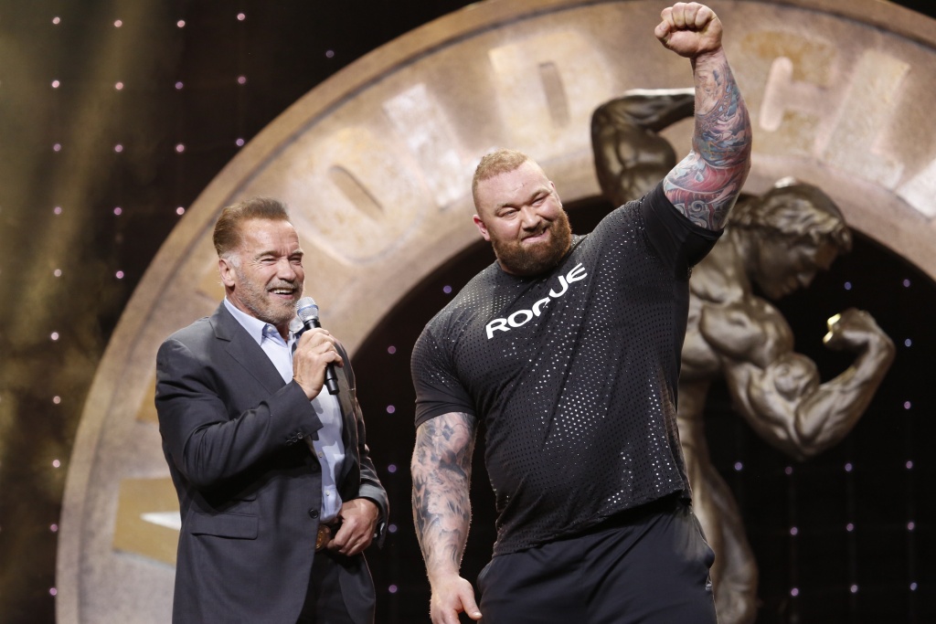 2019 Arnold Strongman Classic Champion Hafthor Bjornsson congratulated by Arnold Schwarzenegger photo by Dave Emery.JPG