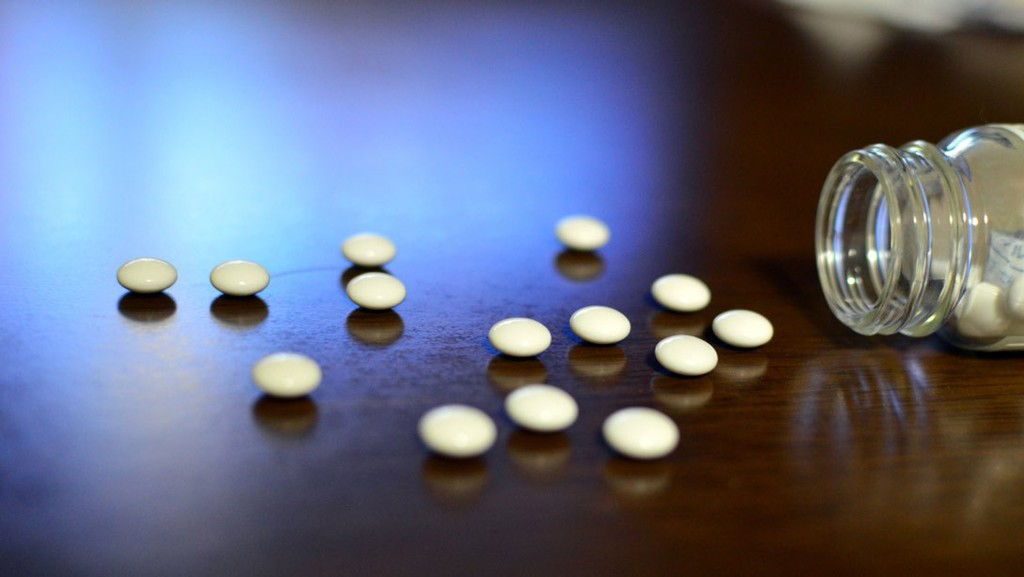 white-pills-falling-out-of-bottle.jpg